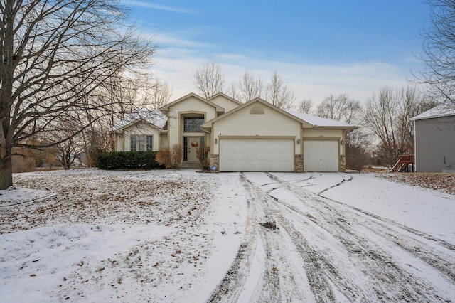 single story home featuring a garage