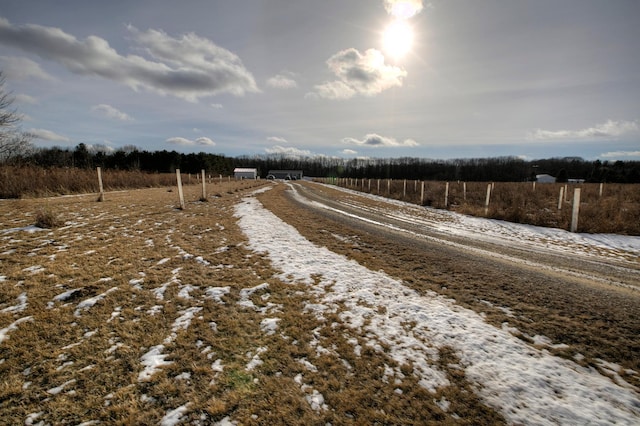 view of road featuring a rural view