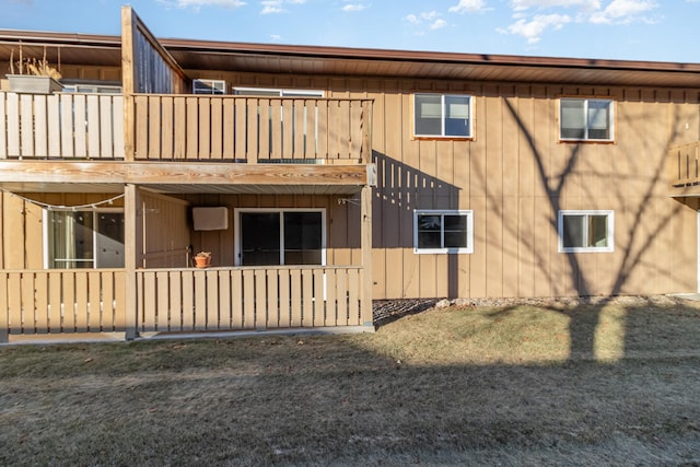 rear view of house with a balcony