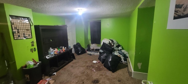 carpeted bedroom featuring a textured ceiling