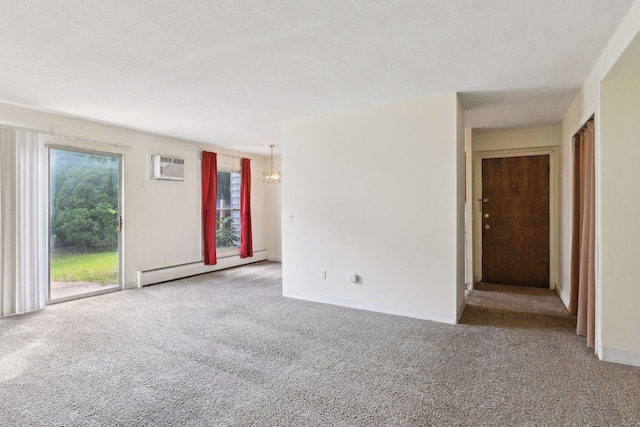 carpeted spare room featuring a wall mounted air conditioner, a notable chandelier, and a baseboard heating unit