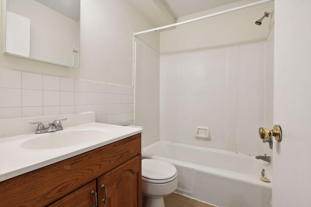 full bathroom with shower / washtub combination, vanity, tile walls, and toilet