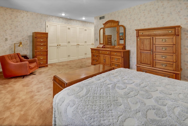 bedroom featuring carpet floors and a closet