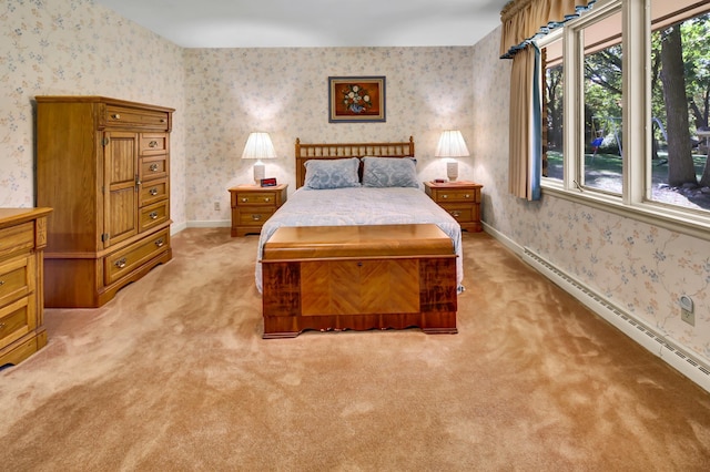 carpeted bedroom with a baseboard radiator