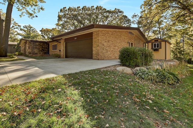 view of side of property featuring a garage