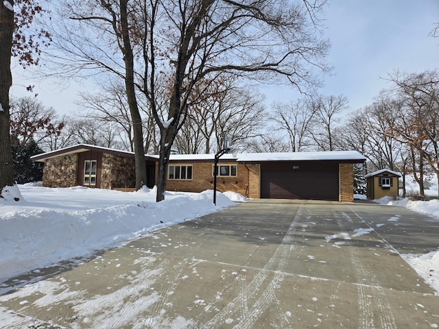 ranch-style home with a garage