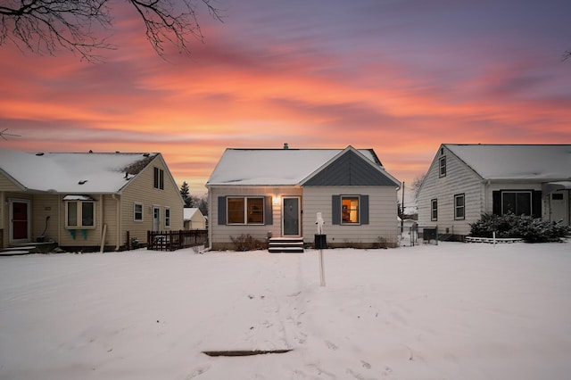 view of snow covered house