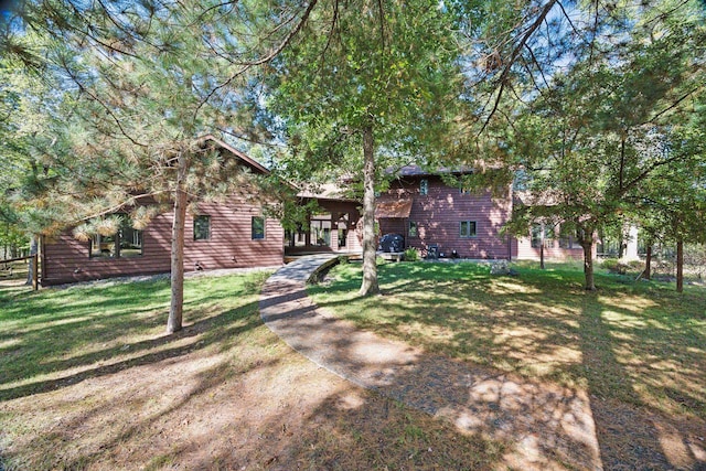 view of front of home with a front lawn