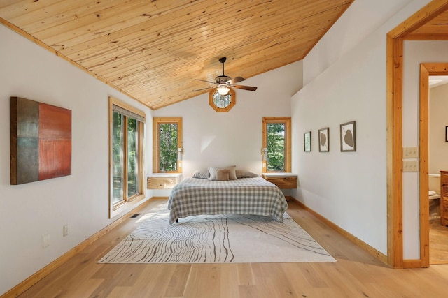 bedroom with wooden ceiling, ensuite bathroom, vaulted ceiling, ceiling fan, and light wood-type flooring