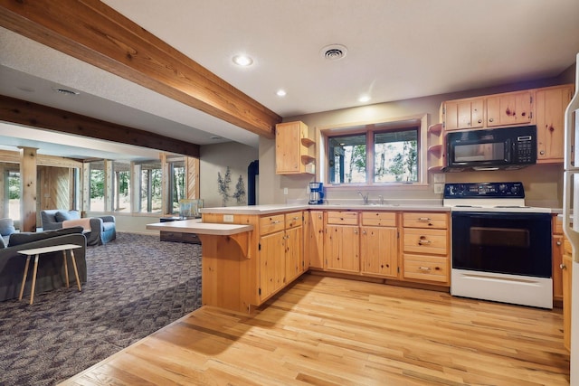 kitchen with electric stove, sink, light hardwood / wood-style flooring, light brown cabinetry, and kitchen peninsula