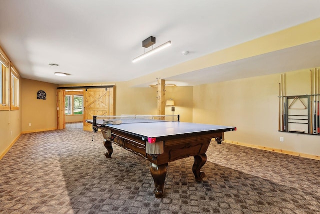 recreation room with a barn door, carpet floors, and pool table