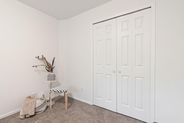 unfurnished room with light colored carpet