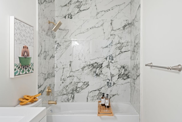 bathroom with vanity and tub / shower combination