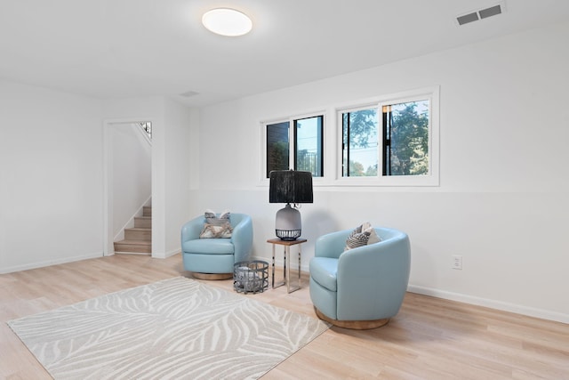 sitting room with light wood-type flooring