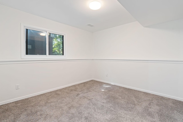 unfurnished room with carpet floors