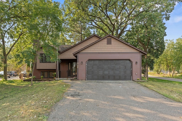 view of front facade featuring a garage and a front yard