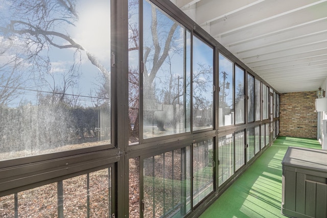 unfurnished sunroom featuring plenty of natural light