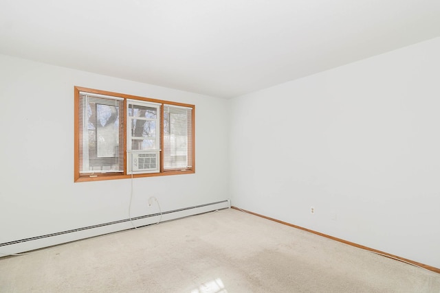 carpeted empty room featuring a baseboard radiator and cooling unit