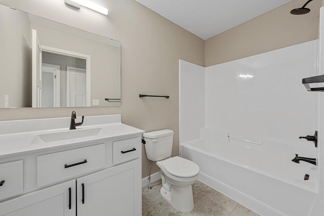 full bathroom featuring vanity, tub / shower combination, a textured ceiling, and toilet