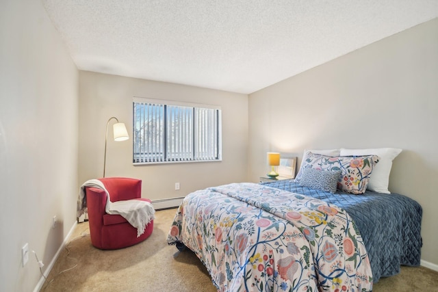 bedroom with carpet floors, a textured ceiling, and a baseboard radiator