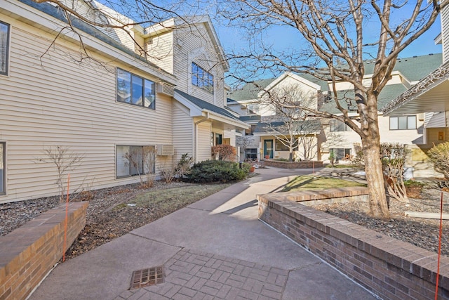 view of property's community featuring a patio area