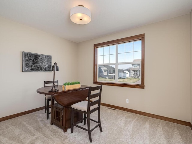 view of carpeted dining room