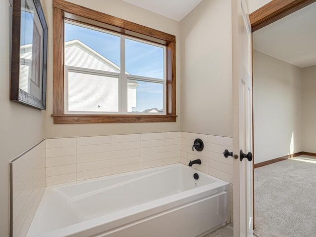 bathroom featuring a tub