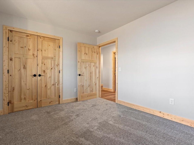 unfurnished bedroom featuring carpet floors