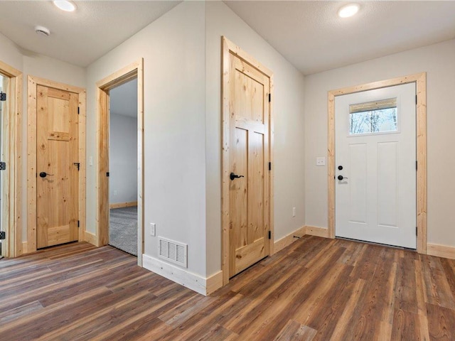 entryway featuring dark hardwood / wood-style flooring