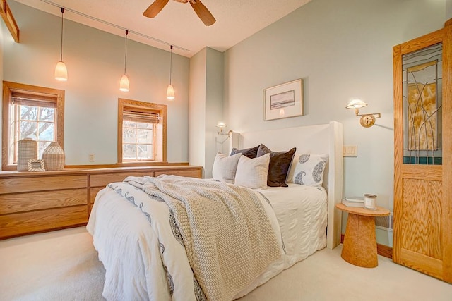 bedroom featuring carpet floors and ceiling fan