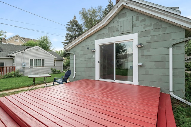 deck featuring a lawn