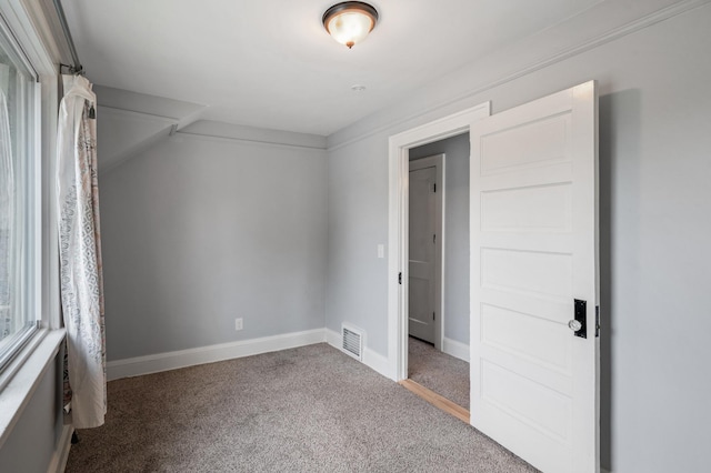 unfurnished bedroom with carpet