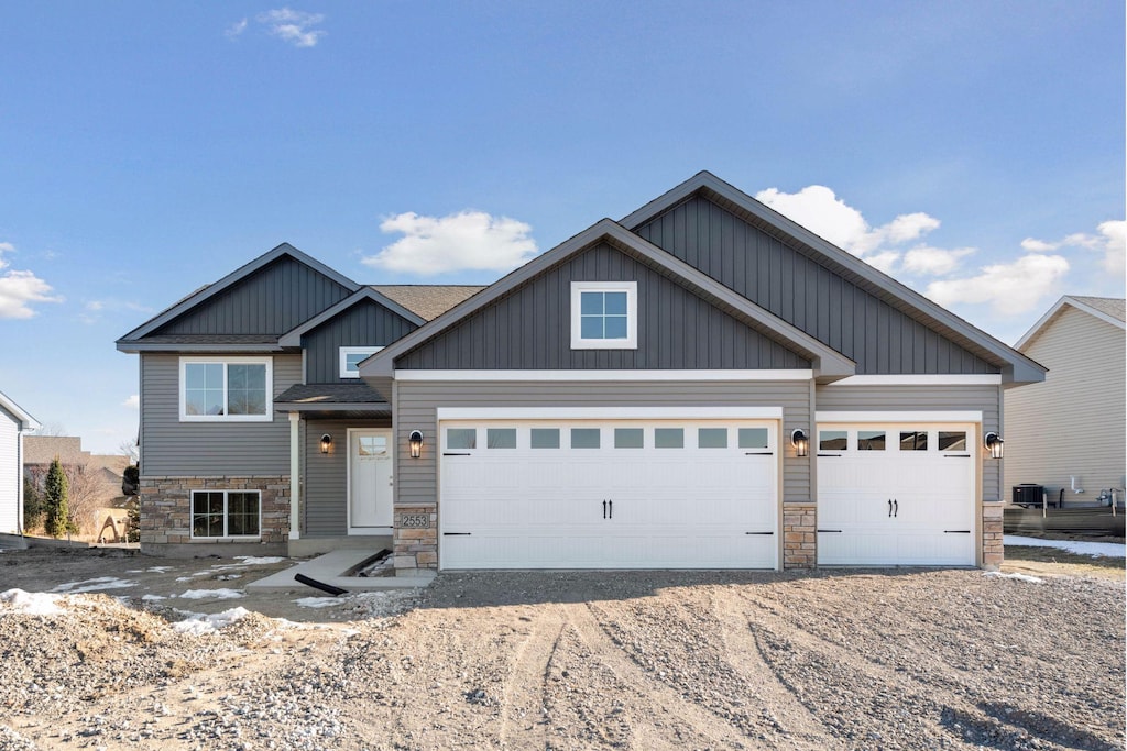 craftsman-style home with a garage