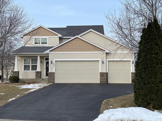 craftsman-style house featuring a garage