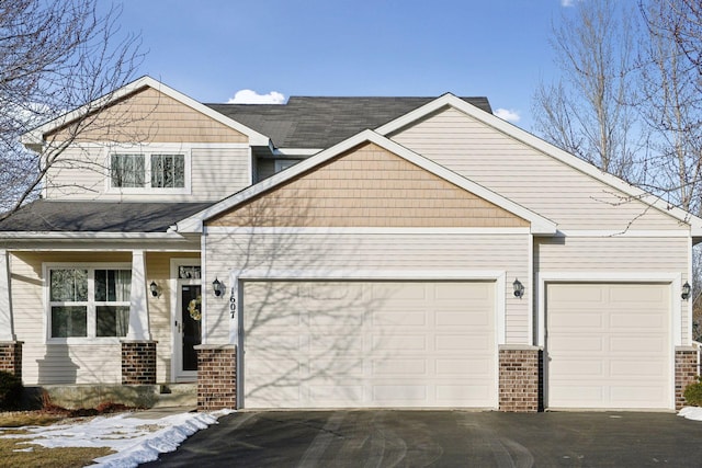 craftsman house with a garage