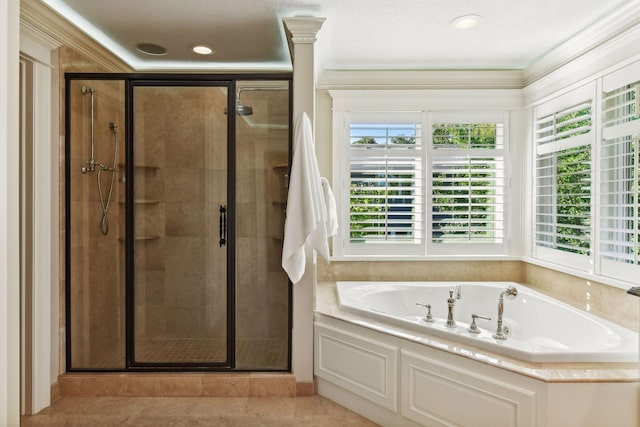 bathroom with ornamental molding, tile patterned floors, and separate shower and tub