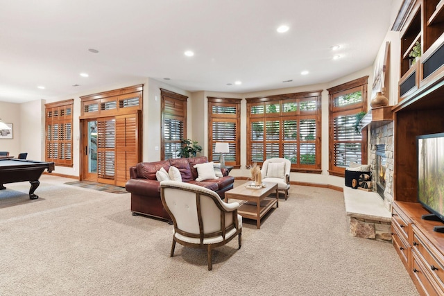 living room featuring light carpet and billiards