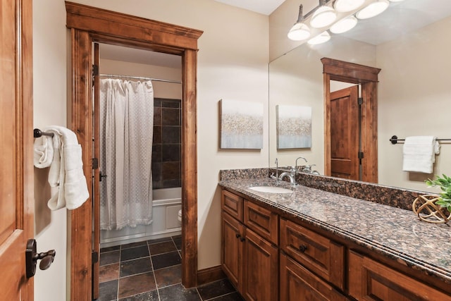 bathroom featuring vanity and shower / bath combination with curtain