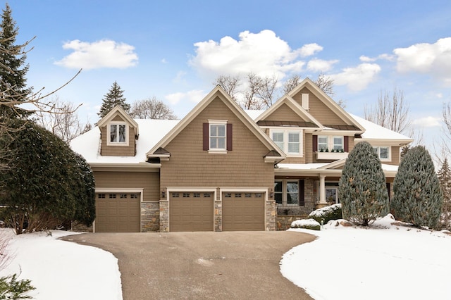 craftsman house featuring a garage