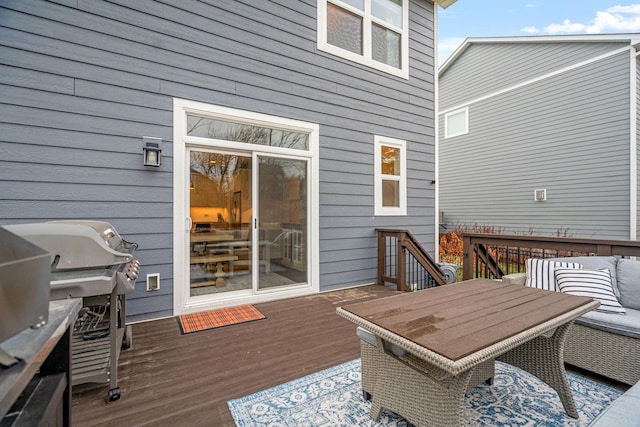 wooden deck featuring grilling area