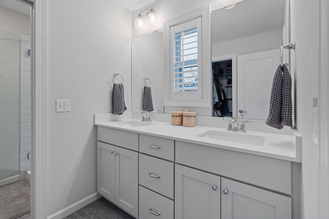 bathroom with vanity and an enclosed shower