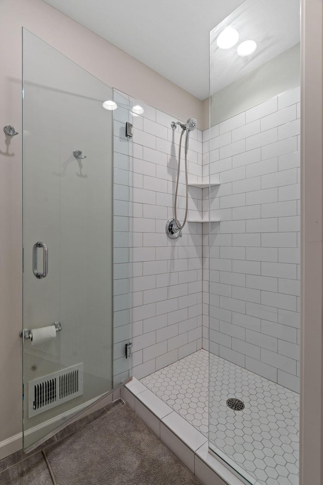 bathroom with an enclosed shower