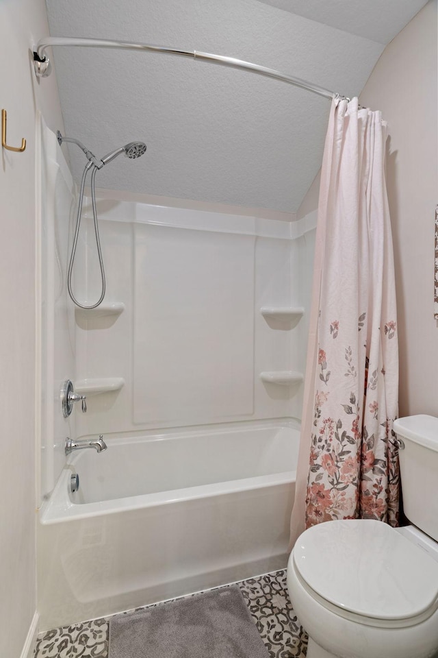 bathroom with vaulted ceiling, toilet, a textured ceiling, and shower / tub combo with curtain