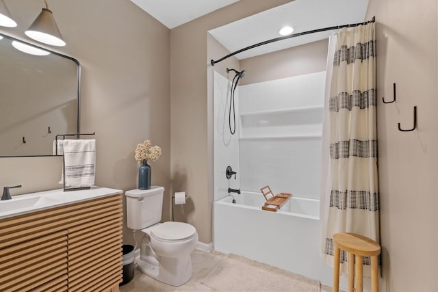 full bathroom featuring vanity, toilet, and shower / tub combo with curtain