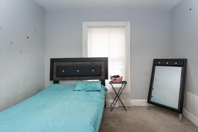 bedroom featuring carpet flooring