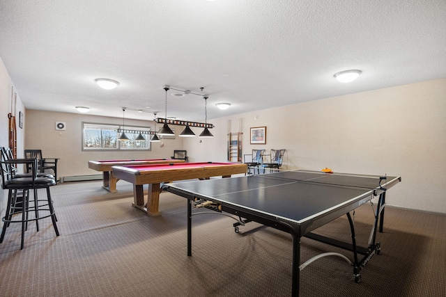 game room with carpet, billiards, a baseboard heating unit, and a textured ceiling