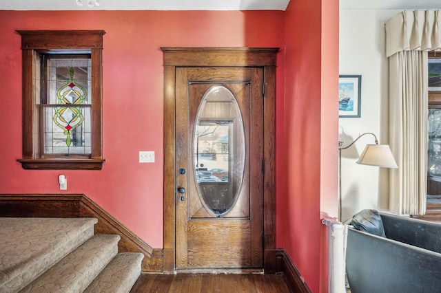 foyer with dark wood-type flooring