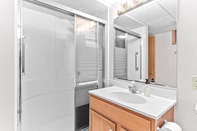 full bath featuring a stall shower and vanity