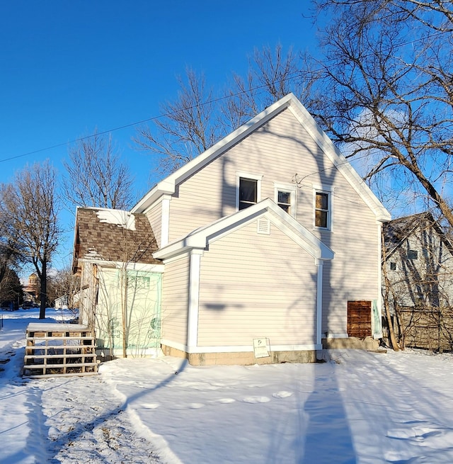 view of snow covered property