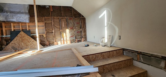 interior space featuring lofted ceiling